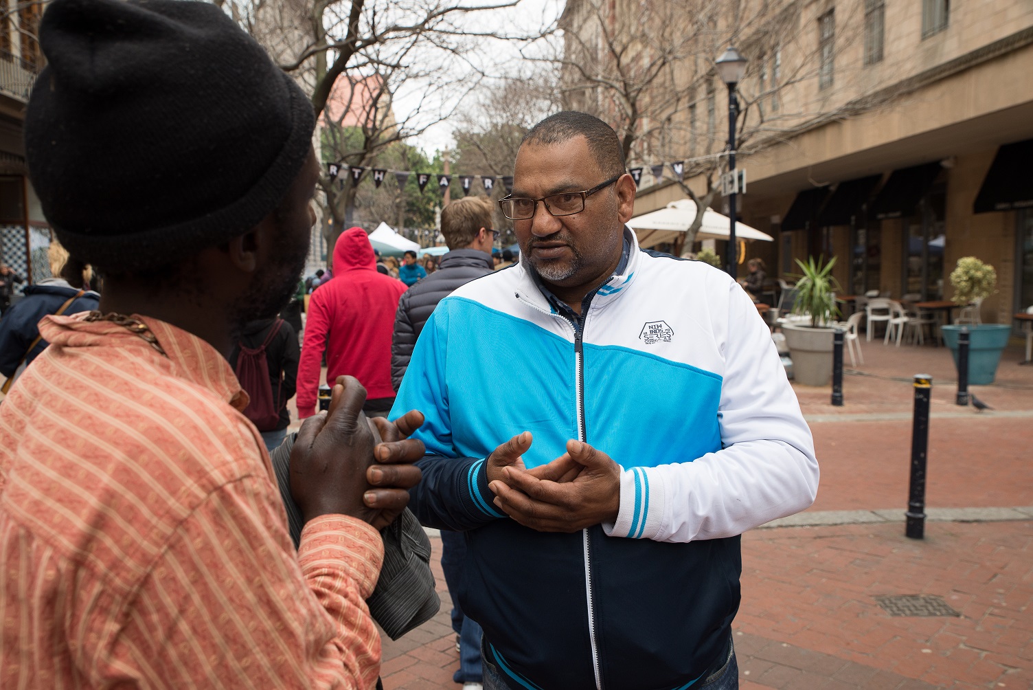 CCID Fieldworker Mark Williams interacting with a client