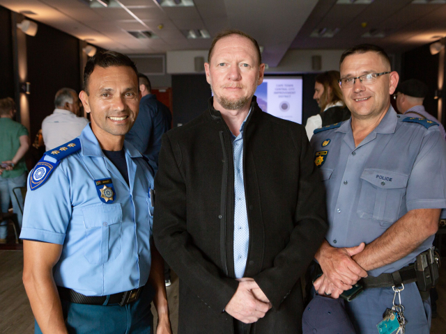 CCID Safety and Security night manager TJ Jenkins with members of SAPS