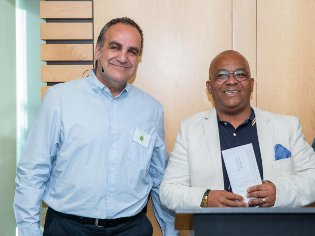 Alec van de Rheede receives 20 year long service award from CCID CEO Tasso Evangelinos