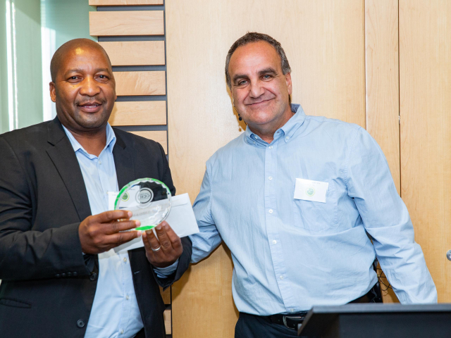 Headman Sirala-rala receives 15 year long service award from CCID CEO Tasso Evangelinos
