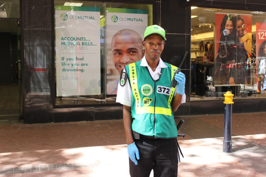 A CCID Public Safety Officer wears gloves