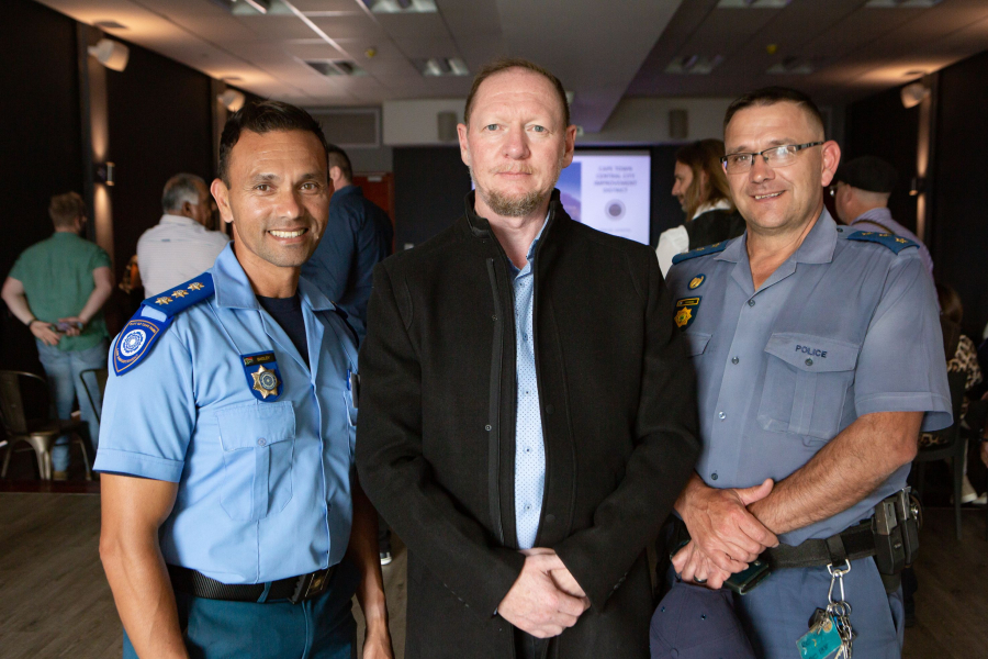 CCID Safety and Security night manager TJ Jenkins with members of SAPS