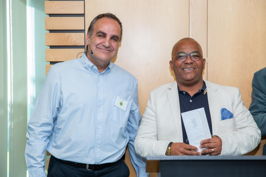Alec van de Rheede receives 20 year long service award from CCID CEO Tasso Evangelinos