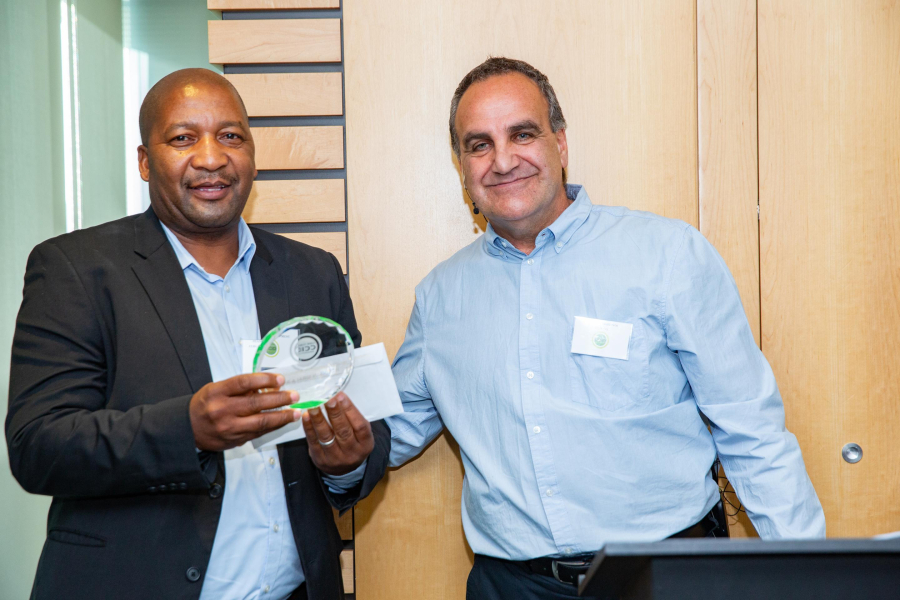 Headman Sirala-rala receives 15 year long service award from CCID CEO Tasso Evangelinos